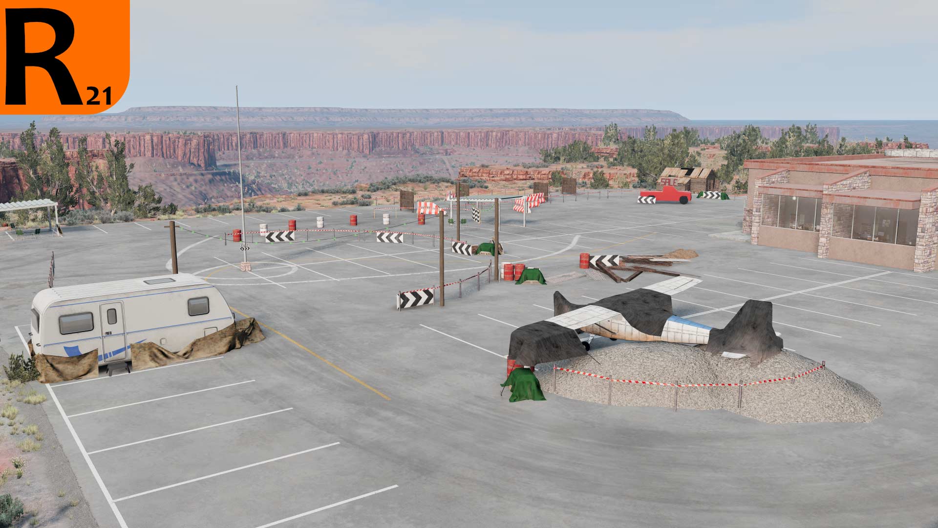 An arial view of the Autocrossed-Up scenario set in a carpark featuring many obstacles including a plane and caravan